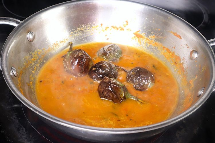 Step 2.3: Add the fried brinjals and sauté well