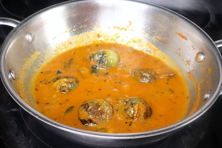 Step 2.4: Add the fried brinjals and sauté well