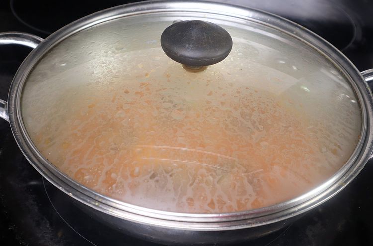 Step 2.2: Cover with a lid and cook for 5 minutes on low flame