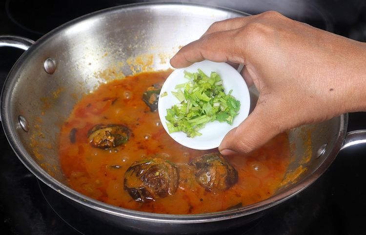 Step 2.3: Open the lid, add the chopped coriander leaves and [garam masala powder,](https://amzn