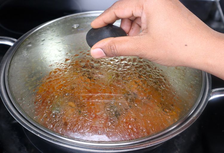 Step 2.7: Open the lid, add the chopped coriander leaves and [garam masala powder,](https://amzn