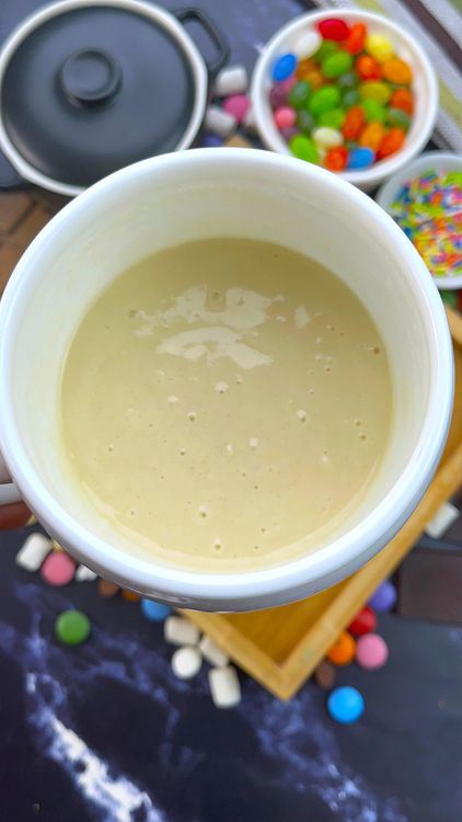Step 1.2: Pour in warm milk and vanilla extract