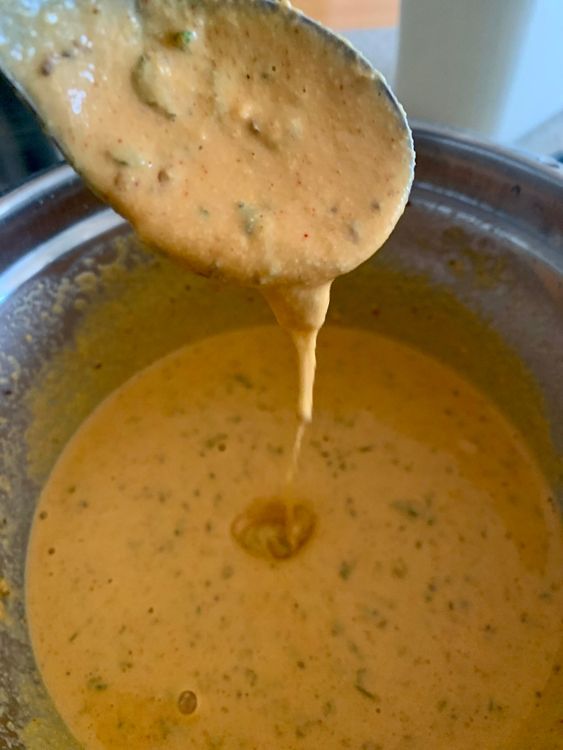 Step 1.1: Add water gradually to the flour mix, and whisk the mixture until it forms a smooth batter