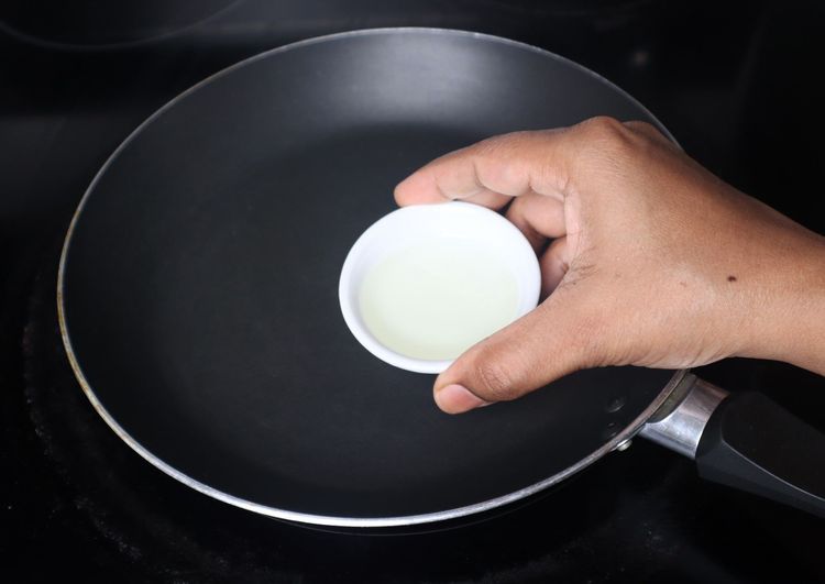 Step 1.1: Heat a pan and add 1 tbsp oil
