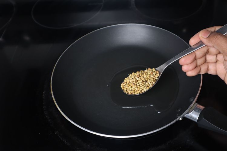Step 1.2: Heat a pan and add 1 tbsp oil