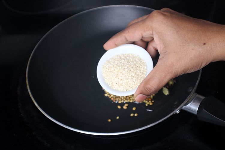 Step 1.8: Heat a pan and add 1 tbsp oil