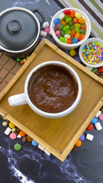 Step 1.1: Place a piece of chocolate or a spoonful of chips in the center and press lightly