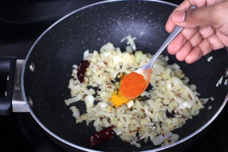 Step 2.2: Add turmeric powder and red chilli powder