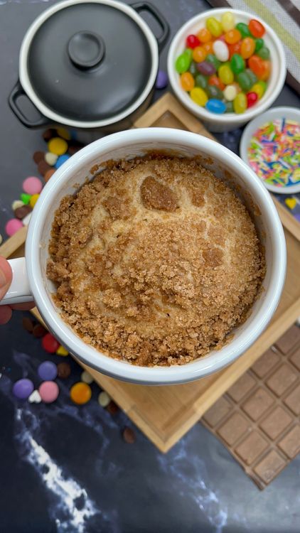 Step 5.1: Cook on HIGH (950 W) for 80–100 seconds, or until the cake rises and the top looks set but still soft