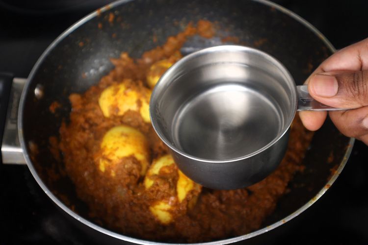 Step 2.5: Add the boiled roasted eggs and mix well