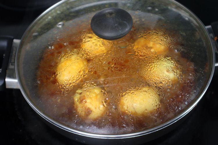 Step 2.9: Add the boiled roasted eggs and mix well