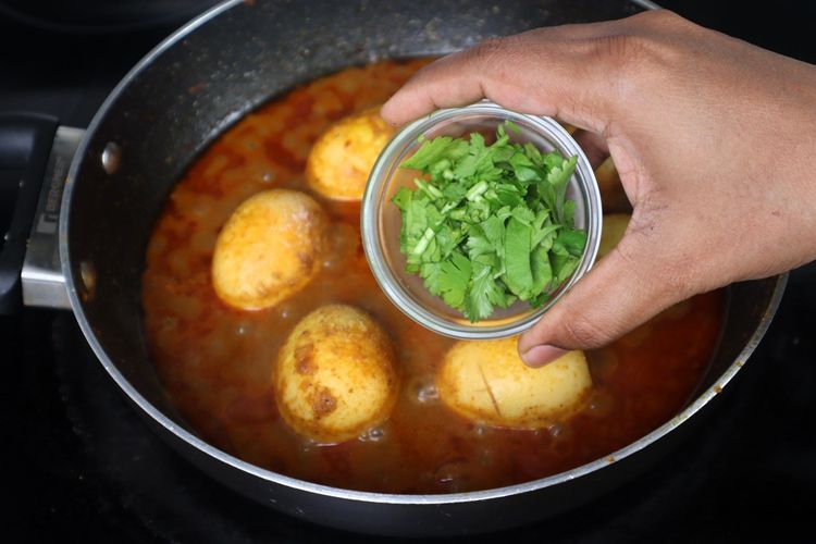 Step 2.3: Open the lid, adjust the salt, and add coriander leaves and [kasuri methi](https://amzn