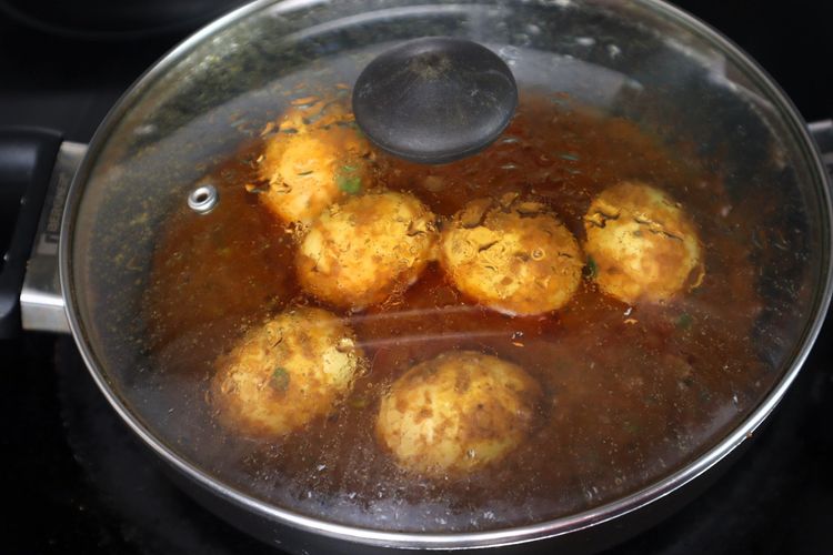 Step 2.6: Open the lid, adjust the salt, and add coriander leaves and [kasuri methi](https://amzn