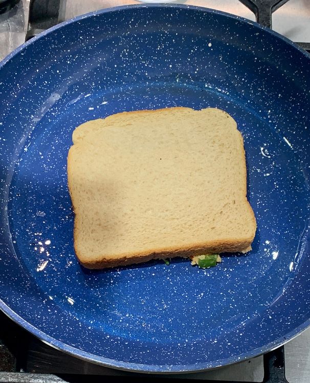 Step 1.1: Place the bread slices on the pan with the potato mixture facing down