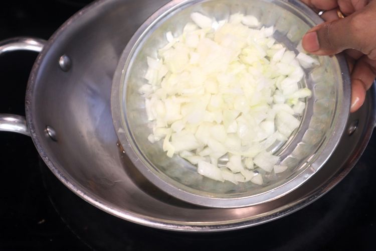 Step 1.1: Add finely chopped onion and sauté for 1 minute