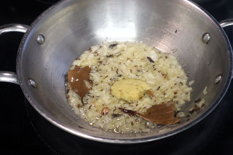 Step 1.4: Add finely chopped onion and sauté for 1 minute