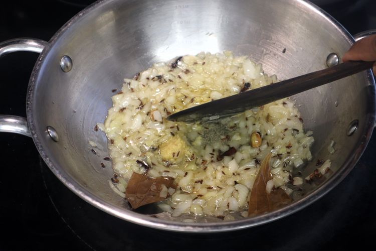 Step 1.5: Add finely chopped onion and sauté for 1 minute
