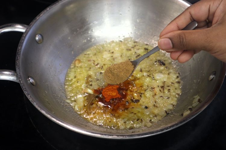 Step 1.3: Add turmeric powder, red chili powder, coriander powder, and cumin powder