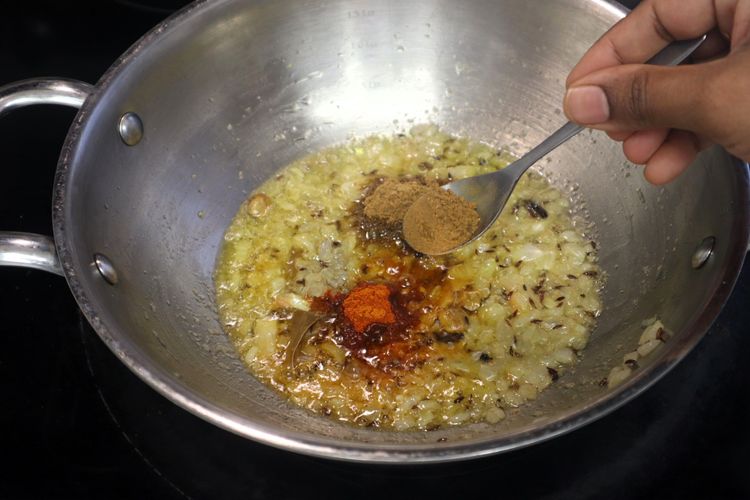 Step 1.4: Add turmeric powder, red chili powder, coriander powder, and cumin powder