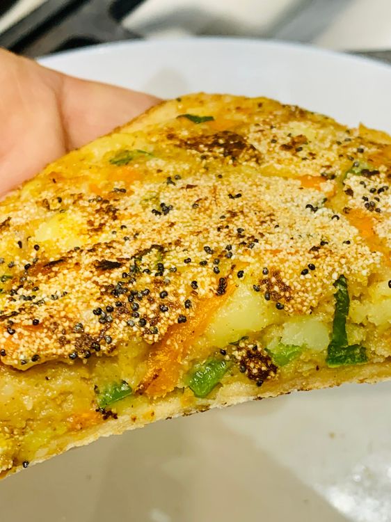 Step 1.1: Transfer the bread sandwich to a plate and cut them into halves