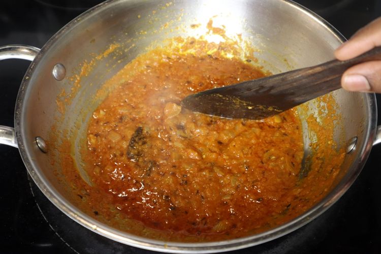 Step 2.4: Add the tomato puree and cook until the oil starts separating from the mixture