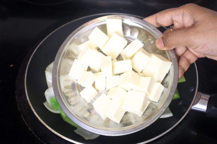 Step 3.1: Add paneer cubes, salt, red chili powder, and black pepper