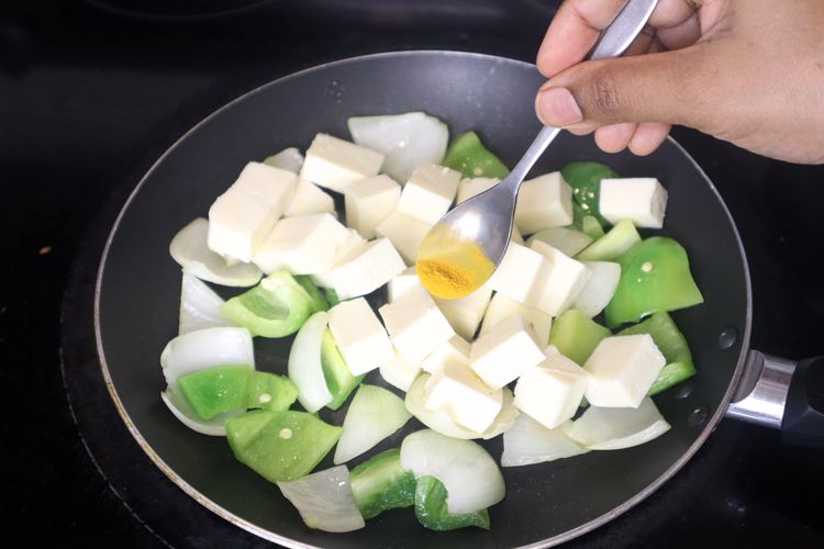 Step 3.3: Add paneer cubes, salt, red chili powder, and black pepper