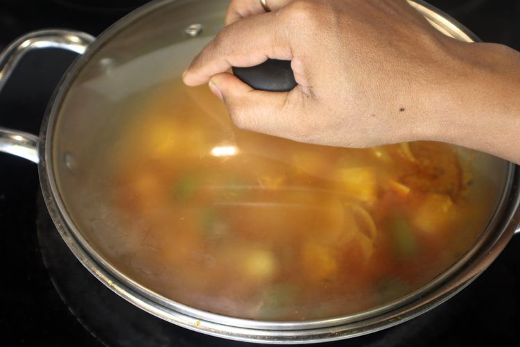 Step 4.1: Cover and cook on low heat for 10 minutes, allowing the flavors to meld