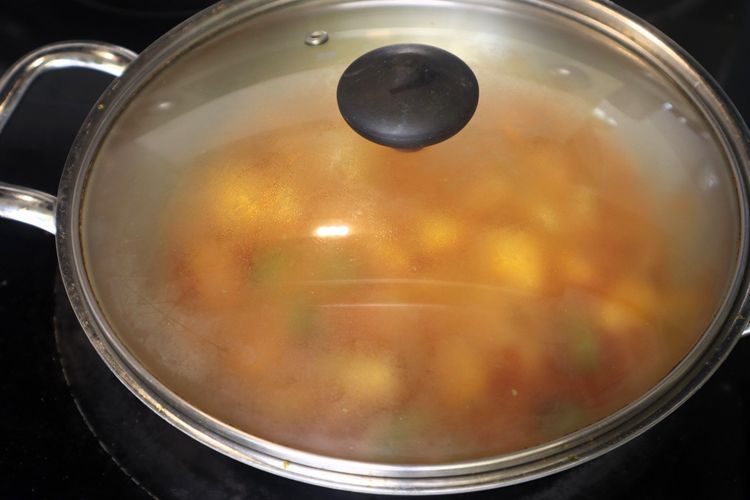 Step 4.2: Cover and cook on low heat for 10 minutes, allowing the flavors to meld