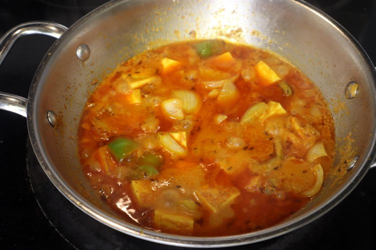 Step 4.4: Cover and cook on low heat for 10 minutes, allowing the flavors to meld