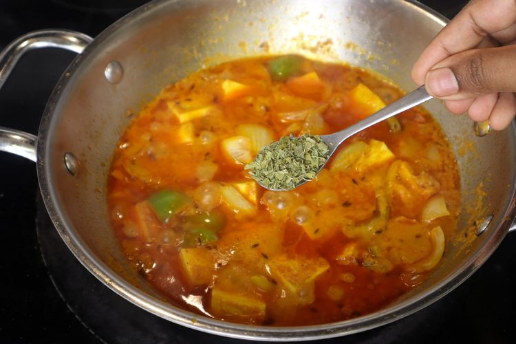 Step 5.1: Add kasuri methi (crush between your palms before adding), garam masala, and salt as needed