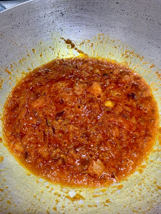 Step 1.2: Add the coriander powder, turmeric, red chilli powder and salt to the wok