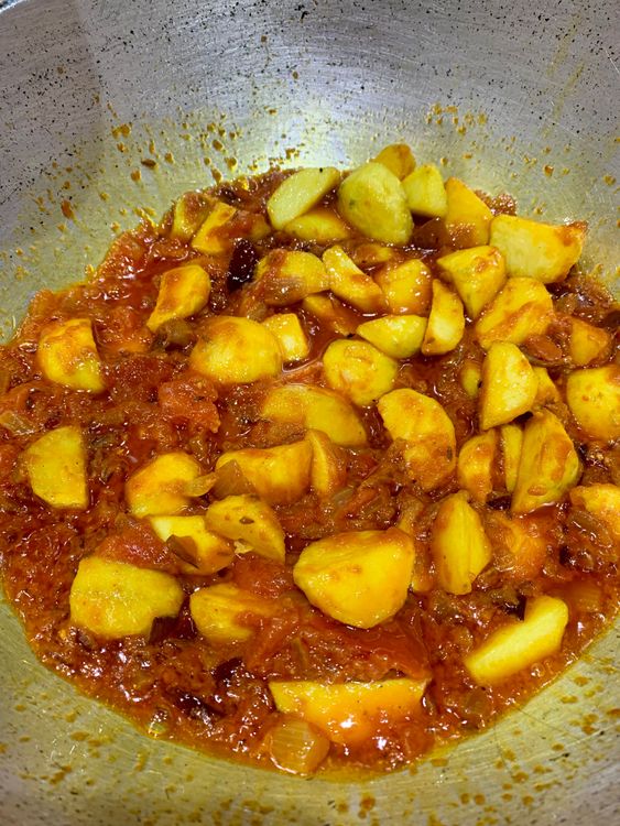 Step 1.1: Add the fried potatoes and mix them well with the gravy
