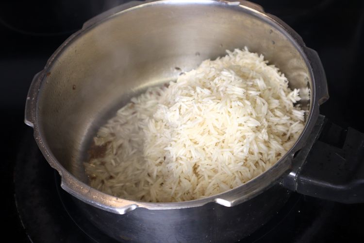 Step 4.2: Add the soaked and drained basmati rice to the pressure cooker