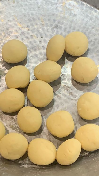 Step 2.3: Take small portions of the dough and shape them into small lemon-sized balls, ensuring there are no cracks