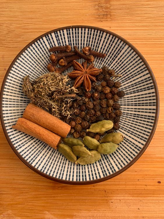 Step 1.1: Dry roast the cinnamon stick, green cardamom, cloves, black peppercorns, stone flower, and star anise in a pan over medium heat until fragrant