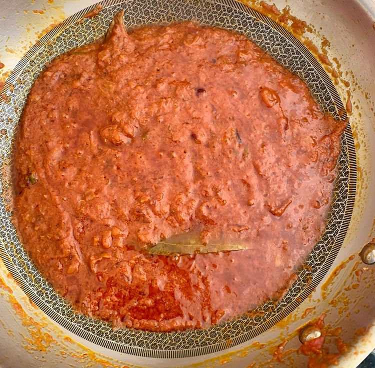 Step 2.1: Add the pureed tomatoes and cook until the oil starts to separate from the mixture