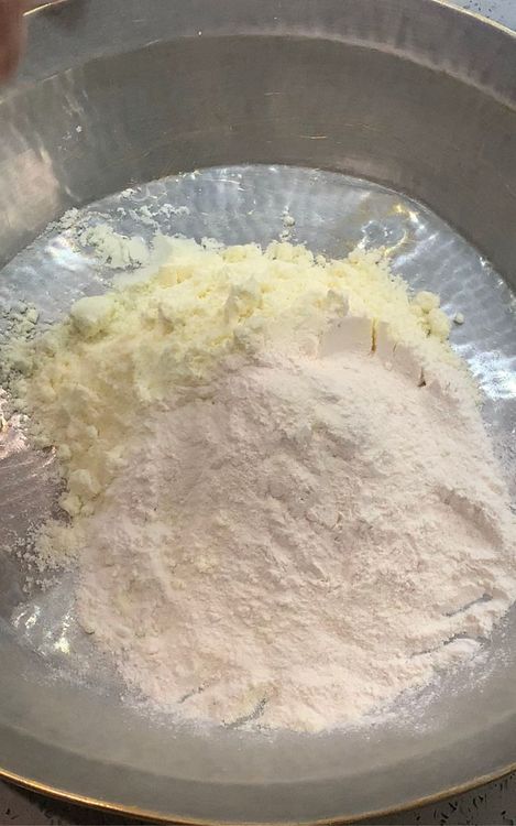 Step 2.1: In a large bowl, combine milk powder and self-raising flour