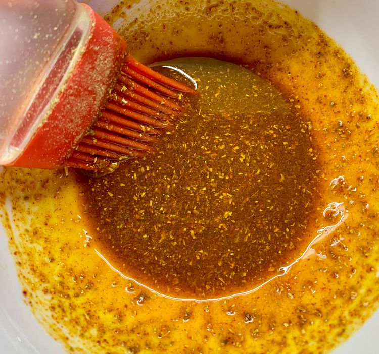 Step 1.1: In a mixing bowl, combine mustard oil, kashmiri red chilli powder, turmeric, cumin powder, coriander powder, and salt to make the marinade