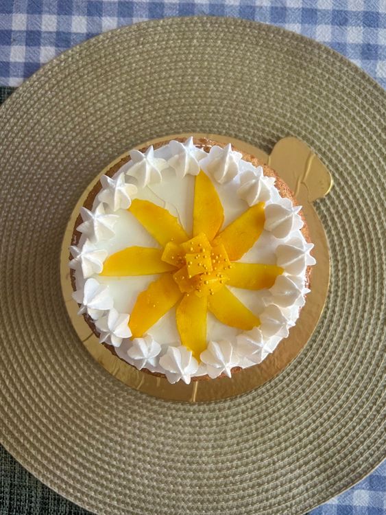 Step 1.1: Enjoy this cake as it is with a dusting of icing sugar or a cup of tea, or frost it with whipped cream and top with slices of juicy mangoes