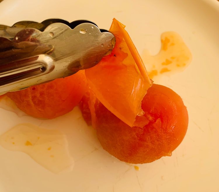 Step 2.1: Boil the tomatoes in water until they are soft