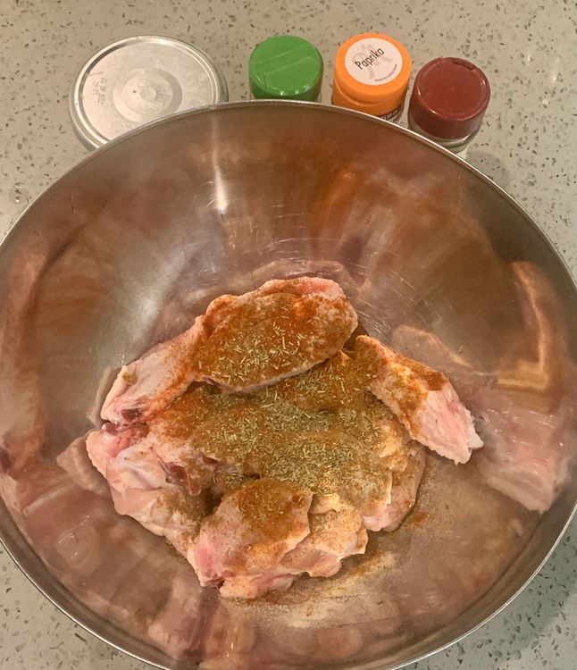 Step 1.1: In a mixing bowl, coat the chicken wings with salt, white pepper powder, cayenne powder, 5 Spice powder, mixed herbs and chopped basil leaves