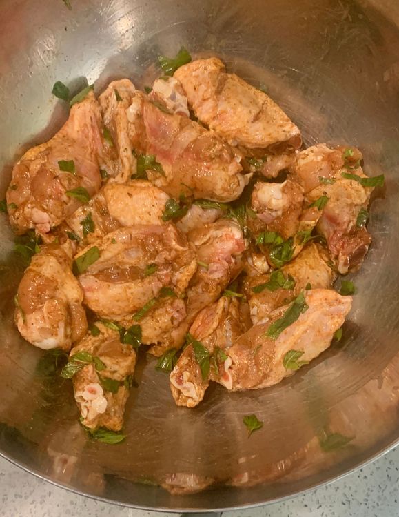 Step 1.3: In a mixing bowl, coat the chicken wings with salt, white pepper powder, cayenne powder, 5 Spice powder, mixed herbs and chopped basil leaves