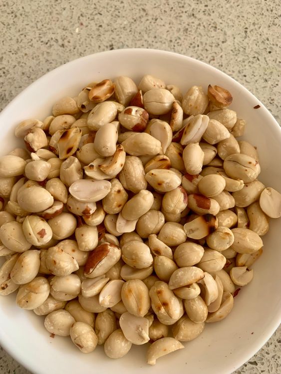 Step 1.2: Dry roast the peanuts in a pan over medium heat until they are fragrant and lightly browned