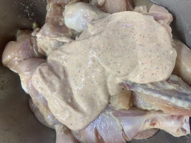 Step 2.1: Coat the vinegar-coated chicken drumsticks with a 3 tbsp yogurt mixture, ensuring each drumstick is well coated