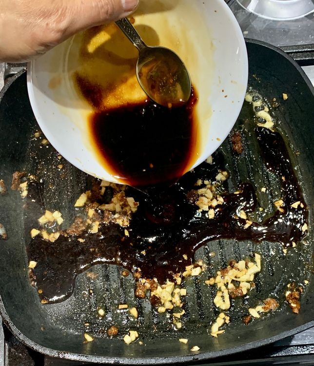 Step 1.1: Add the prepared sauce mix to the pan and let it simmer on low heat for a few seconds until it thickens slightly