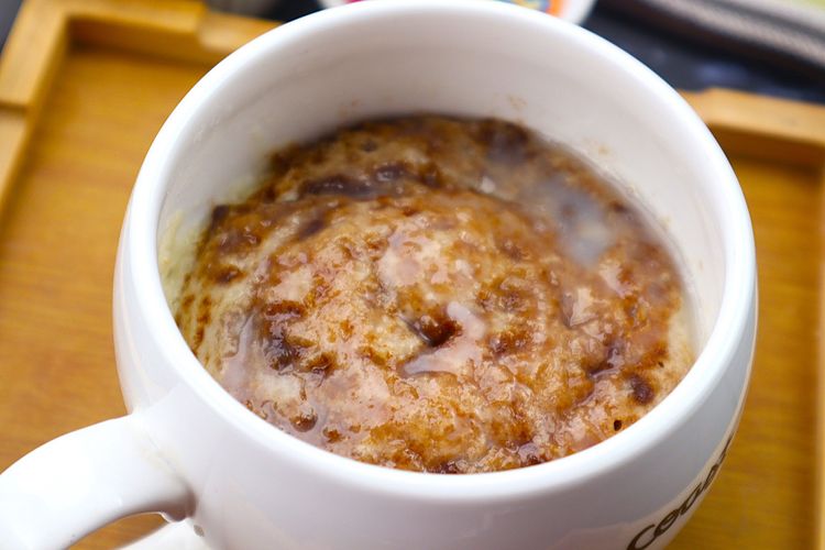 Step 5.1: Mix powdered sugar with milk to make a quick glaze, then drizzle it over the mug cake if desired