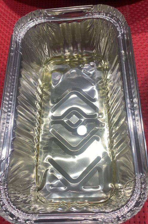 Step 1.1: Grease a baking pan or a foil tray with 2 tbsp of olive oil