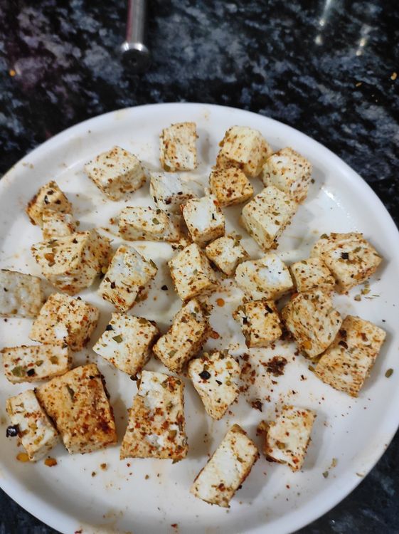 Step 1.1: Coat paneer with  red chilli powder, black pepper powder and chilli flakes