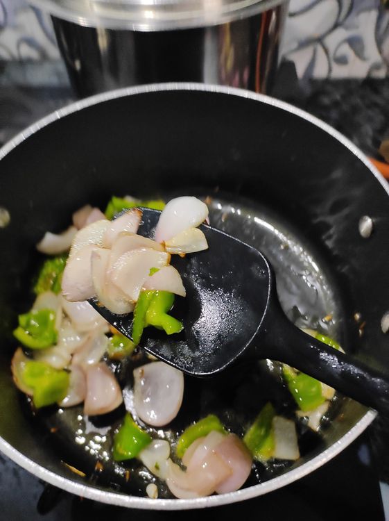 Step 1.1: Add oil ,Onions, Capsicum fry till light golden colour 